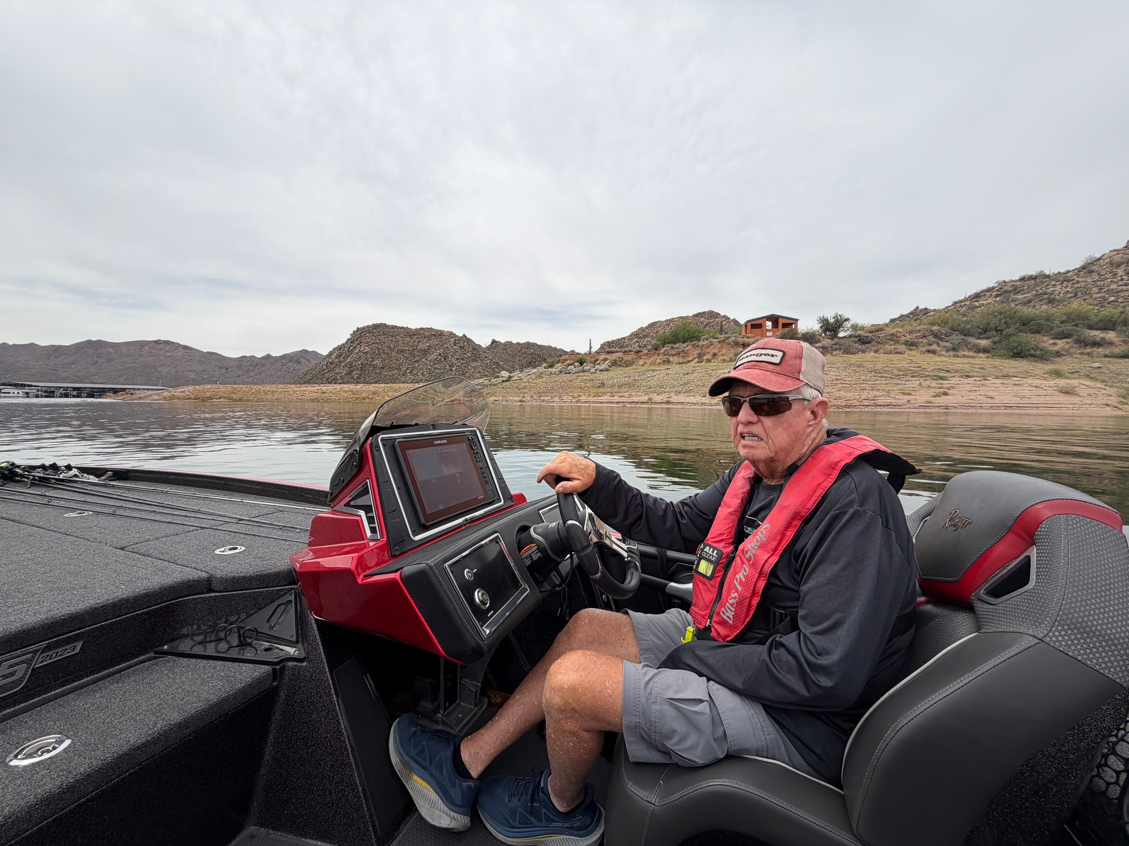 Happy angler with a fish catch on an Arizona guided fishing trip