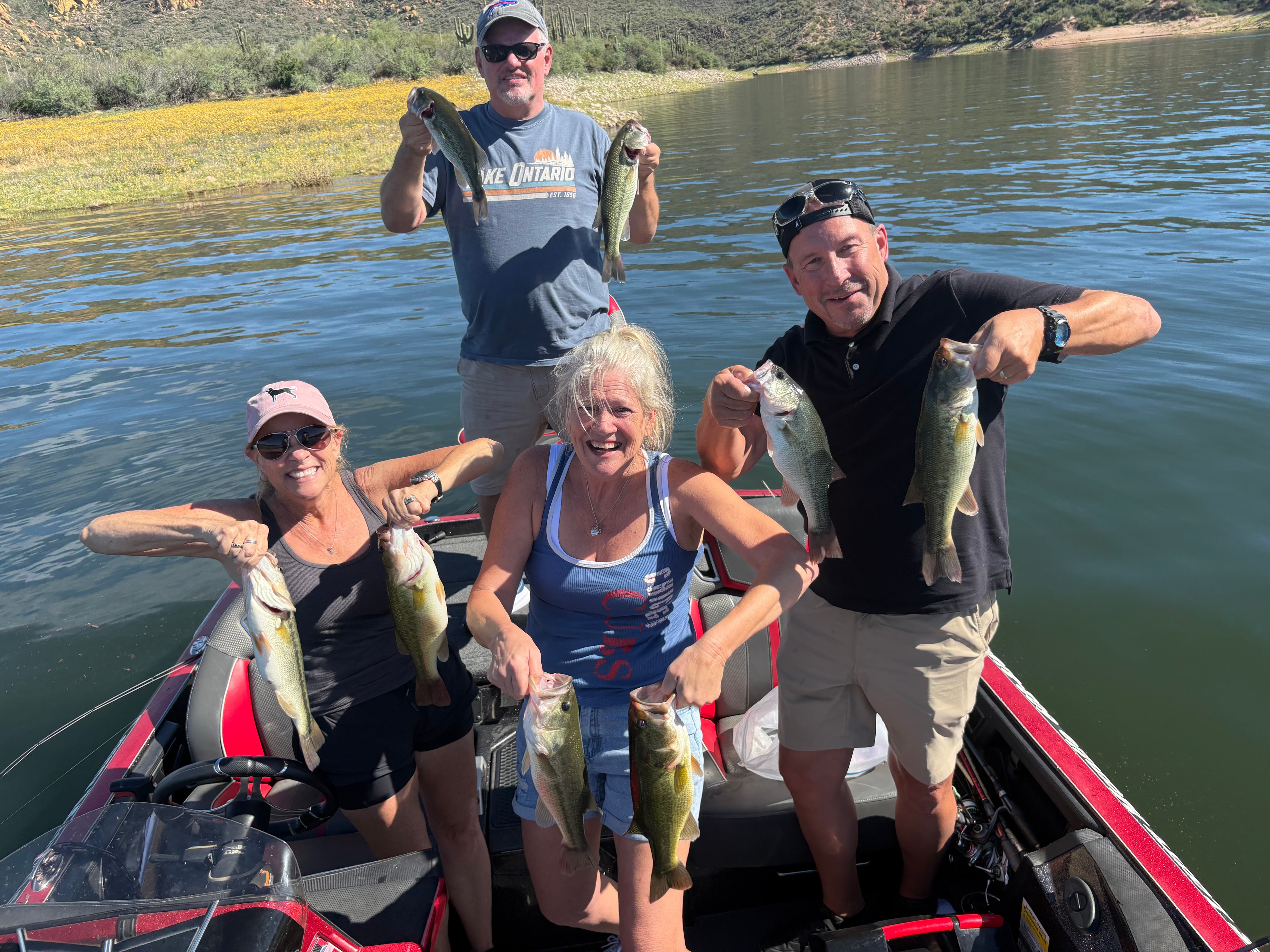 Group fishing trip with caught bass